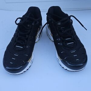 Nike Gray Sneakers with Gold Details
